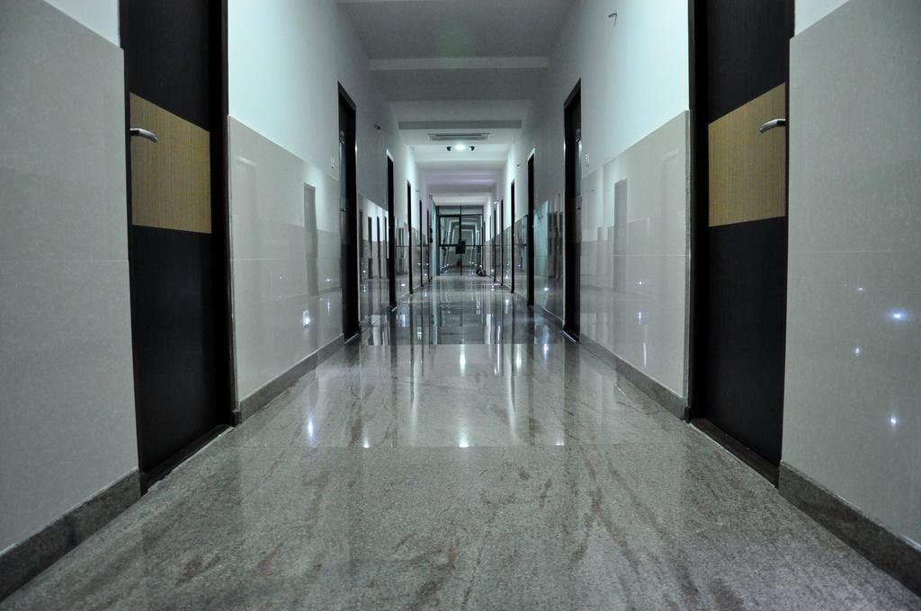 Hotel The Home Tirupur Habitación foto